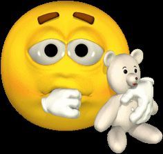 a yellow smiley face holding a white teddy bear in front of it's face