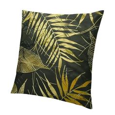 a black and gold pillow with leaves on it