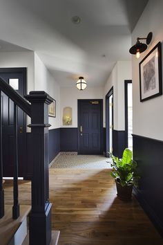 the hallway is clean and ready for us to use as an entrance way in this house