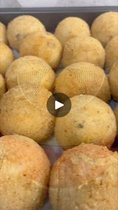 a pan filled with muffins sitting on top of a counter