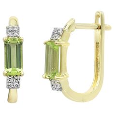 Earrings Yellow Gold 14 K (Matching Ring Available) Diamond 8-RND-0,02-G/VS2A Chrysolite 1-0,39ct Weight 2.07 grams With a heritage of ancient fine Swiss jewelry traditions, NATKINA is a Geneva based jewellery brand, which creates modern jewellery masterpieces suitable for every day life. It is our honour to create fine jewelry, and it’s for that reason that we choose to only work with high-quality, enduring materials that can almost immediately turn into family heirlooms. From our selection of Modern Jewellery, Jewellery Brand, Matching Ring, Matching Rings, Family Heirloom, Modern Jewelry, Jewelry Branding, Vintage Earrings, Pretty Things