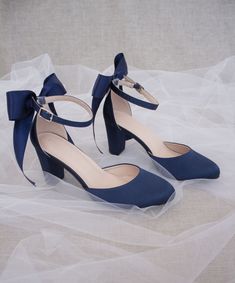 An all-time classic and elegant style with simplicity of satin heels with a satin back bow and removable ankle strap.DETAILS:HEEL HEIGHT: 3 inchesCOLORS AVAILABLE: Champagne, White, Ivory, Navy, Burgundy, and Light BlueUPPER: Synthetic upper and liningMATERIALS: Mandmade outsoleSTYLE NAME: SARAH Dark Blue Heels, Blue Heels Wedding, Graduation Shoes, Navy Wedges, Homecoming Shoes, Navy Heels, Navy Blue Shoes, Closed Toe Heels, Satin Shoes