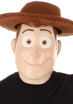 a man wearing a brown hat with big eyes