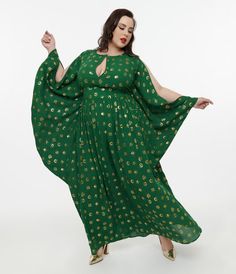 This beautiful plus size caftan, in collaboration with Disney, is crafted in a stunning green fabric that features a gold foil print of moon and stars throughout. Beautifully framed with long flutter sleeves and a back zipper. Plus Size Caftan, Wide Leg Jeans Cropped, High Low Gown, Gold Foil Print, Gold Moon, Moon Print, Leopard Print Blouse, 1960s Fashion