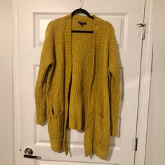 Express Mustard Golden Cardigan Sweater Flattering Mustard / Gold Color Very Soft Woven Fabric Perfect Layering Piece For Fall/ Winter New Without Tags Never Worn!! Mustard Sweater Plus Size, Mustard Long Sleeve Winter Cardigan, Cozy Yellow Knit Cardigan, Yellow V-neck Sweater Affordable, Cream Sweater Cardigan, Yellow Fitted V-neck Cardigan, Mustard Cardigan, Aztec Print Cardigan, Purple Cardigan