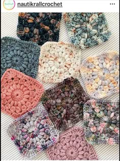 several crocheted squares sitting on top of a white table covered in lots of different colors