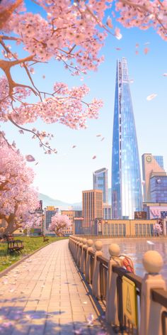 a city with cherry blossom trees in the foreground