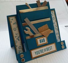 a father's day card made out of construction paper with tools attached to it