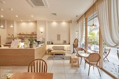 an open kitchen and dining room with sliding glass doors