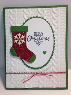 a christmas card with a stocking on it