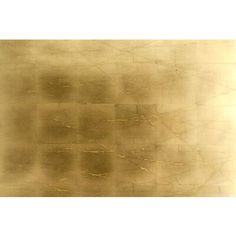 an abstract gold background with white and black lines on the bottom right corner, as well as some brown spots in the middle