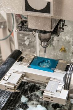 a machine that is making something blue