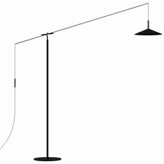 the floor lamp is black and has two lamps on it, one with a cord attached to