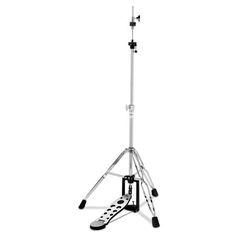 a small tripod stands on top of a white background with black and white images