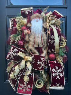 a christmas wreath with a santa clause on it