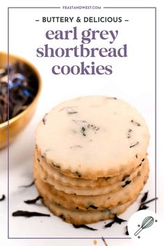 a stack of shortbread cookies sitting on top of a white plate next to a bowl of chocolate chips