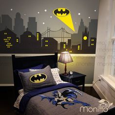 a batman themed bedroom is shown in this image