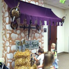 children are playing in the playroom with toys and decorations on display at the school