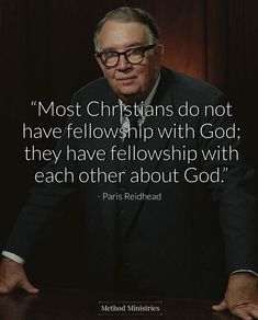 a man in a suit sitting at a table with his hands on his hips and the quote most christians do not have fellowship with god, they have