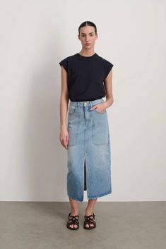 A classic calf length skirt in a slim fit, cut from our classic indigo dyed cotton denim that has been stone washed for a chic casual everyday feel. Chic Washed Denim Skirt, Classic Dark Wash Cotton Denim Skirt, Relaxed Fit Denim Skirt In Medium Wash For Work, Relaxed Fit Medium Wash Denim Skirt For Work, Medium Wash Relaxed Fit Denim Skirt For Work, Chic Relaxed Fit Medium Wash Denim Skirt, Everyday Denim Blue Cotton Skirt, Chic Medium Wash Relaxed Fit Denim Skirt, Everyday Cotton Denim Skirt With Frayed Hem