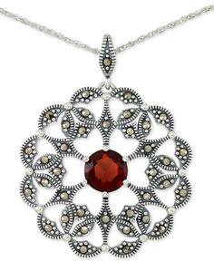 A crimson rhodolite garnet is centered within an artistically scalloped openwork design, laden with marcasite to create this stunning sterling silver pendant necklace. Sterling Silver Marcasite, Rhodolite Garnet, Sterling Silver Necklace Pendants, Jewelry Repair, Silver Pendant Necklace, Sterling Silver Pendant, Spring Rings, Online Jewelry, Sterling Silver Pendants