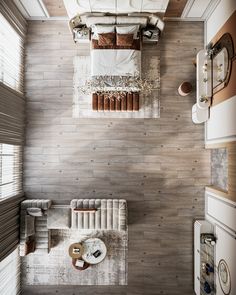 an overhead view of a bedroom with a bed, desk and other furniture in it