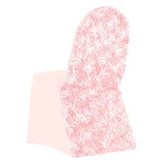 a pink chair with white flowers on the back and seat cover, sitting against a white background