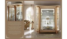 an ornate display cabinet with glass doors and gold trimmings in a living room