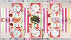 an overhead view of a colorful table setting