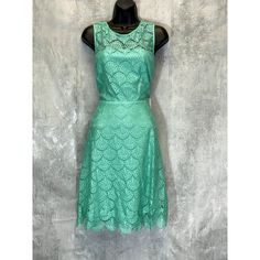 Kensie Women's Turquoise Lace Sleeveless Keyhole Fit & Flare Mini Dress Sz 14 Crew Neck Sleeveless Back Cutout With Button-Loop Closure Back Concealed Zip Closure Illusion Yoke And Back Solid Color Lace Construction Lined Scalloped Eyelash Hem Imported This Is A New With Tags/Box Item. Please Refer To Images. Approx. Measurements: * Waist: 16" * Length: 38" * Chest: 17" * Sleeves: " Retail Price: $118.00 Sleeveless Green Lace Midi Dress, Elegant Sleeveless Midi Dress In Turquoise, Elegant Sleeveless Turquoise Midi Dress, Elegant Turquoise Sleeveless Midi Dress, Summer Green Lace Midi Dress, Sleeveless Turquoise Chic Midi Dress, Chic Sleeveless Turquoise Midi Dress, Elegant Sleeveless Turquoise Dress, Turquoise Knee-length Party Dress