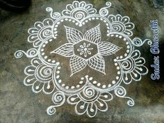 an intricately designed design on the ground