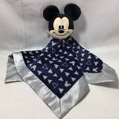 a mickey mouse bandana is shown on a white background with a blue and silver triangle