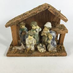 a nativity scene with figurines in the shape of a mangerau