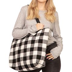 This spacious Buffalo Plaid carry-all is perfect for busy days when you're toting a lot but still want to look on point.

100% Polyester fabric construction.

Double Handles.

Tablet compatible (std. size 8-10in).

Zip top closure
Approximate Size: 19.5L x 14H x 6W Bridal Party Tote Bags, Map Tote Bag, Bride Tote, Tote Bag With Zipper, Plaid Tote Bag, Bridesmaid Tote Bags, Buffalo Plaid Flannel, Plaid Tote, Buffalo Check Plaid