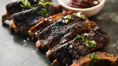 grilled meat with sauce and parsley on the side