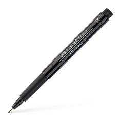 a black pen that is on top of a white surface