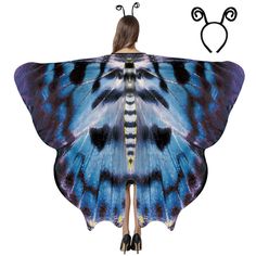 a woman wearing a blue butterfly wings with black and white stripes on it's wings