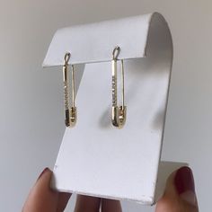 14k goldfill safety pin earrings Gift Safety Pin Shaped Single Earring, Everyday Safety Pin Single Earring, Gold Safety Pin Earrings For Everyday, Minimalist Safety Pin Jewelry For Pierced Ears, Safety Pin Shaped Earrings With Ear Wire, Safety Pin Earrings As Gift, Minimalist Safety Pin Earrings, Minimalist Gold Safety Pin Earrings, Single Safety Pin Earring