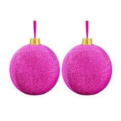 two pink ornaments hanging from a gold colored string on a white background with clipping for text