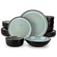 a set of black and green dishes