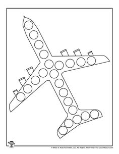 an airplane that is flying in the sky with dots on it's tail and wings