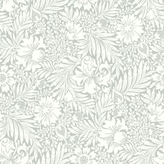 a brown and white wallpaper with flowers on it