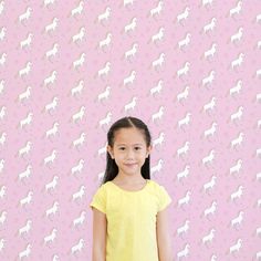 Introducing our enchanting "Unicorn Trails" wallpaper, designed to ignite the imaginations of little ones everywhere. Picture this: delicate unicorns prancing through a world of heart-shaped blossoms against a soothing pink backdrop. Each unicorn, with a gracefully flowing mane and a twinkling horn, invites your child into a realm of magic and wonder. This pattern doesn't just brighten up a room—it turns everyday play into a fairy tale adventure. At Teepee Joy, we believe in creating magical spa