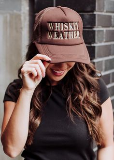 Whiskey weather is our favorite kind of weather at Panache! Our newest brown trucker hat features our well-known "Whiskey Weather" phrase, and is perfect for a fall day out with friends. Brown trucker hat Tan "Whiskey Weather" embroidered on the front Adjustable snapback closure Breathable mesh in the back Designed in the U.S.A. Produced in China. Nashville Hat, Brown Trucker Hat, Black Trucker Hat, Knitted Hats Kids, Knit Hat For Men, Nashville Outfits, Fall Hats, Blouse Tank Top, Fall Day