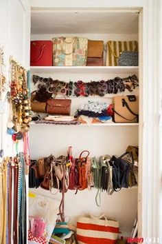 the closet is full of handbags and purses