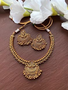 South Indian Necklace With Gold Plating. Indian Bridal Temple Traditional One Gram Jewelry Choker Set. Gorgeous 24 K gold plated. Very Gorgeous and elegant one 24 k thick micron gold plated dainty Polki necklace set Comes with matching earrings Earrings: Pushback Necklace Closure: adjustable via a handmade chord ( slide lock) Highest quality and craftsmanship Ready to ship from New Jersey, United States Gold Temple Necklace With Peacock Design For Wedding, Gold Chandbalis With Peacock Design For Wedding, Gold Peacock Design Chandbalis For Wedding, Round Temple Necklace With Latkans For Wedding, Bridal Necklace For Puja And Festivals, Bridal Necklace With Latkans For Festivals, Round Bridal Necklace For Puja And Festivals, Round Bridal Necklace With Latkans For Festivals, Round Temple Necklace With Peacock Design For Weddings