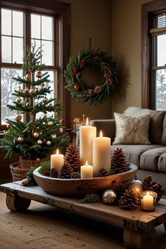 a living room filled with christmas decorations and candles on top of a wooden coffee table