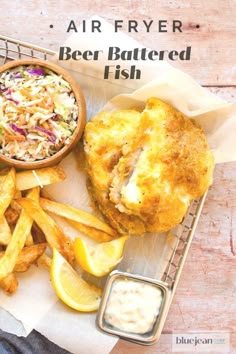 an air fryer beer battered fish with fries and coleslaw