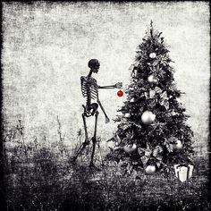 a skeleton standing next to a christmas tree with an ornament in its hand