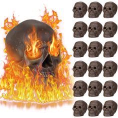 there are many skulls in the fire with flames around them and one skull has its mouth open